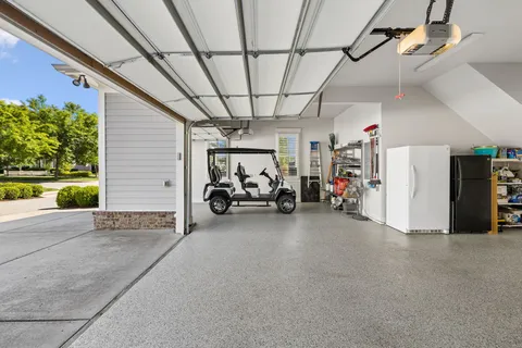a view of parking garage with cars