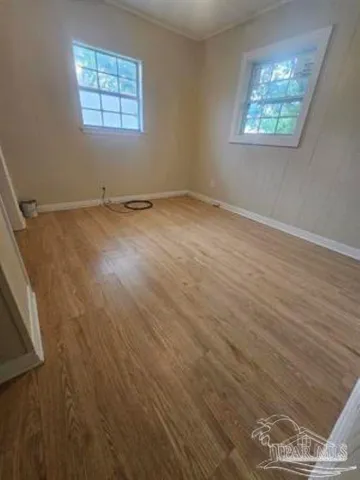 an empty room with windows