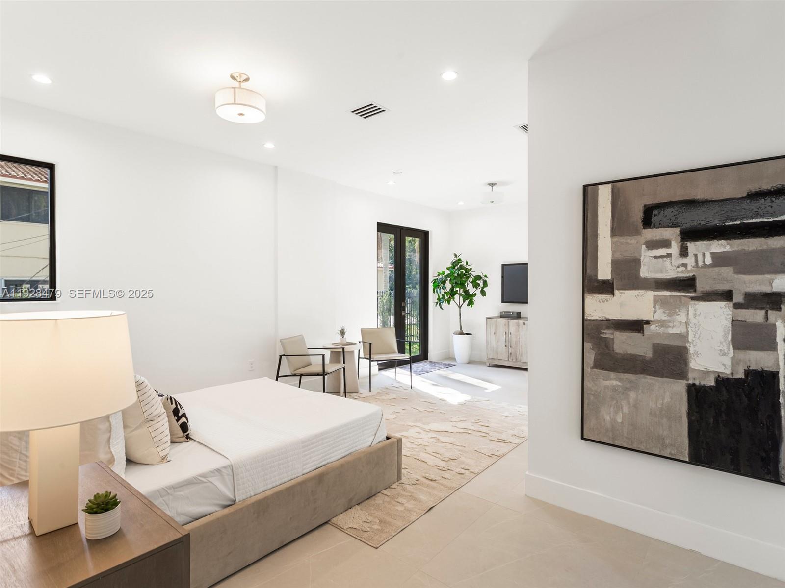 7285 Southwest 72nd Street Miami, FL 33143 - Photo 24 of 53 a living room with furniture and a table