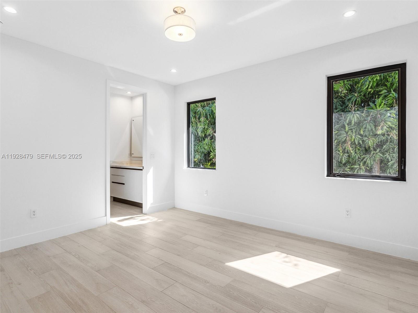 7285 Southwest 72nd Street Miami, FL 33143 - Photo 36 of 53 an empty room with windows