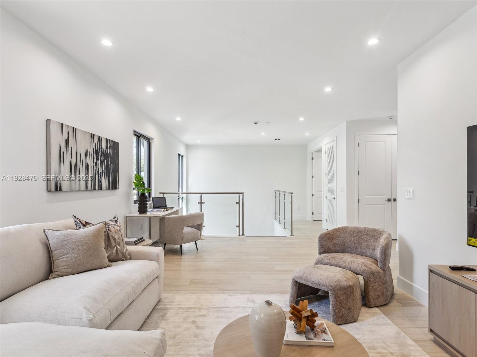 7285 Southwest 72nd Street Miami, FL 33143 - Photo 45 of 53 a living room with furniture and a large window