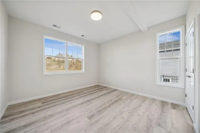 an empty room with windows