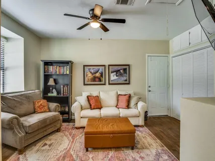 a bedroom with a bed and lamp