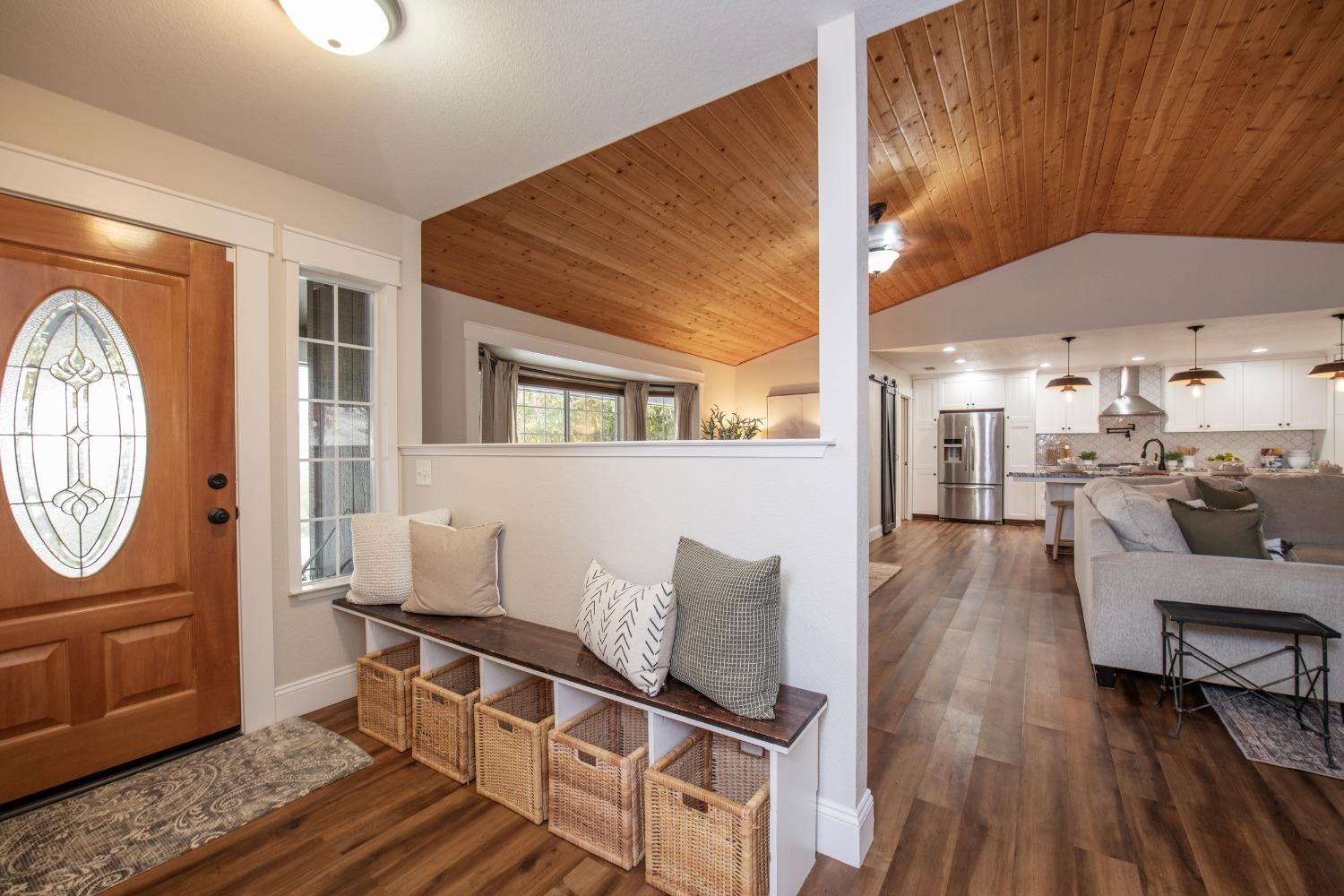 25390 White Thorne Road Clovis, CA 93619 - Photo 9 of 50 a living room with furniture and a wooden floor