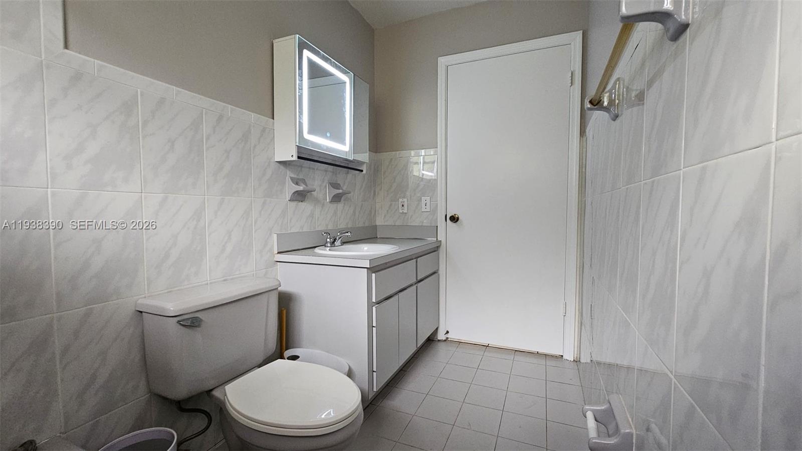 2912 Southwest 38th Court, Unit 2912 Miami, FL 33134 - Photo 13 of 21 Hallway Bathroom