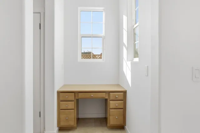a room with a door and a window