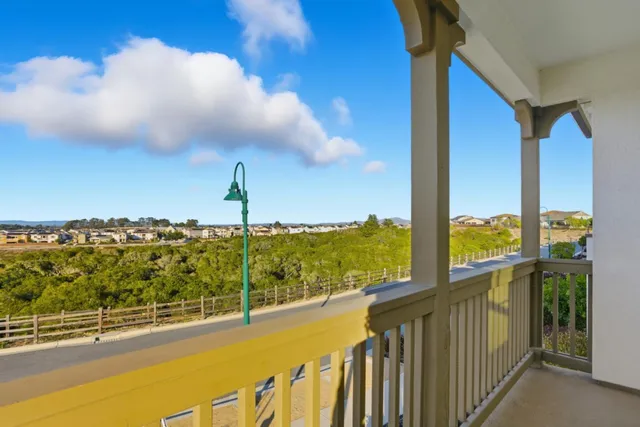 a view of a city from a balcony