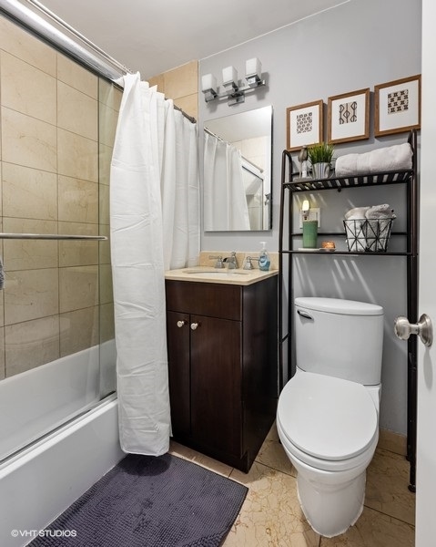 2930 North Sheridan Road, Unit 312 Chicago, IL 60657 - Photo 10 of 14 a bathroom with a toilet and a shower