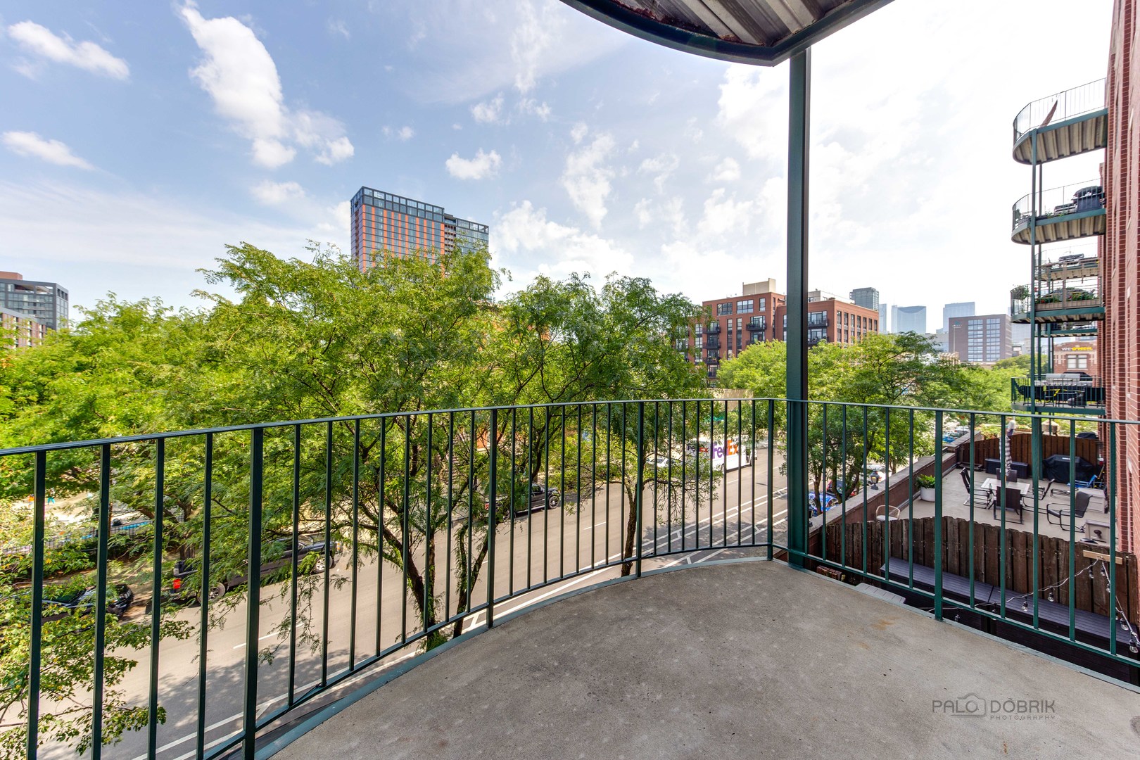 1301 West Washington Boulevard, Unit 309 Chicago, IL 60607 - Photo 15 of 23 a view of a balcony with yard