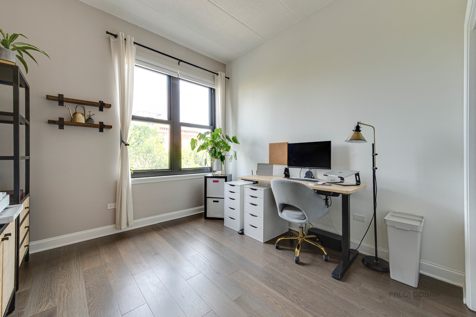 1301 West Washington Boulevard, Unit 309 Chicago, IL 60607 - Photo 19 of 23 a view of a workspace with furniture and a window