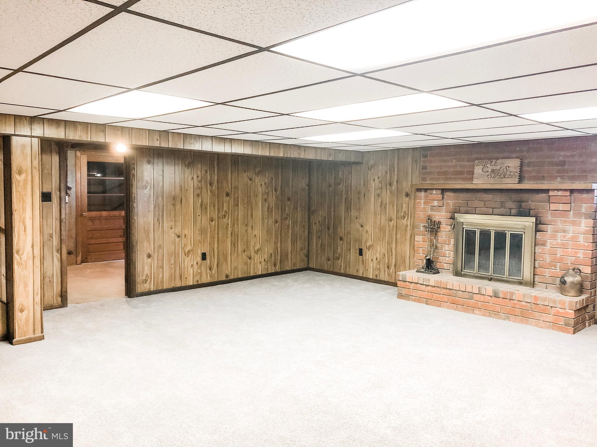 476 Eagle Road Kutztown, PA 19530 - Photo 20 of 44 Family Room in Basement, with Wood Fireplace