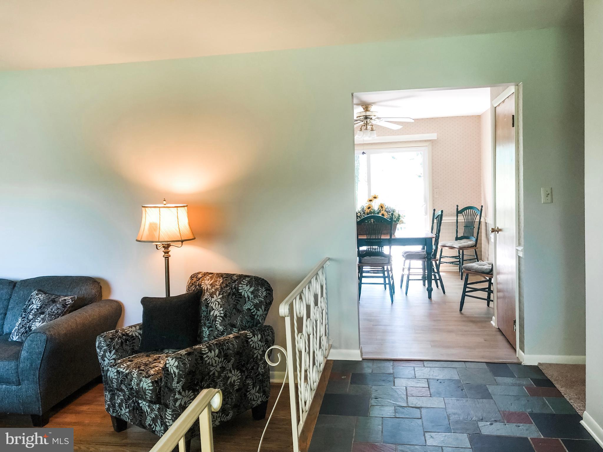 Foyer walking in to dining area/kitchen