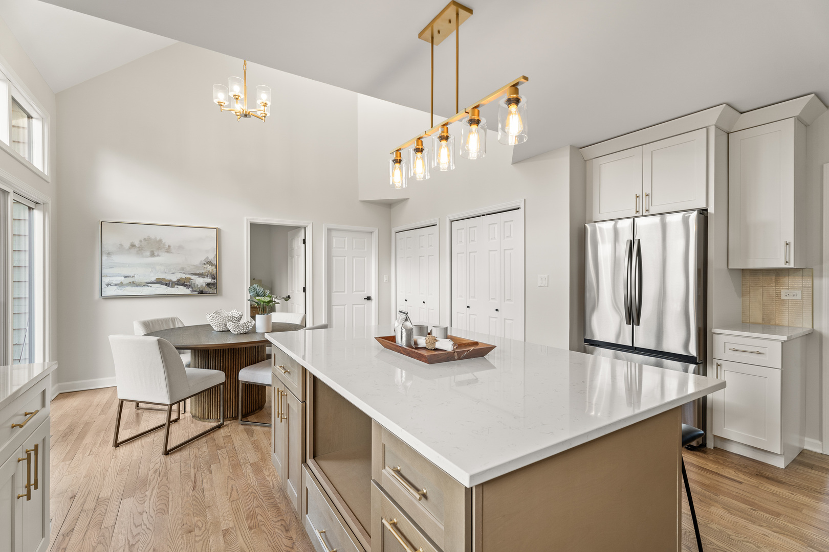 2817 Modaff Road Naperville, IL 60565 - Photo 6 of 43 a kitchen with stainless steel appliances a table chairs and wooden floor