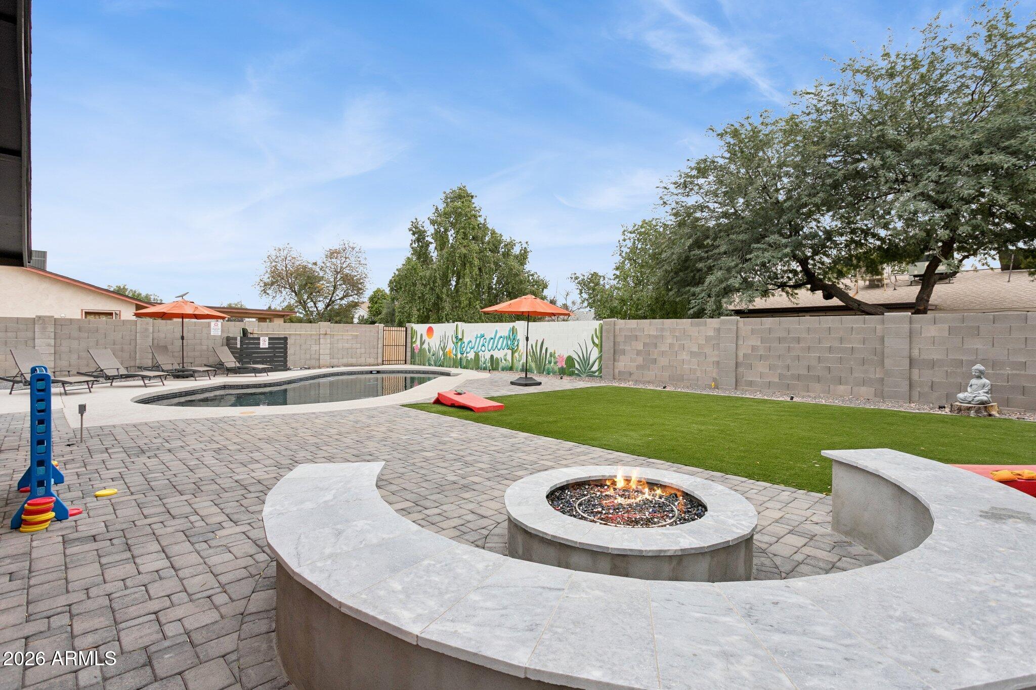 8725 East Osborn Road Scottsdale, AZ 85251 - Photo 28 of 33 a view of outdoor space and outdoor seating