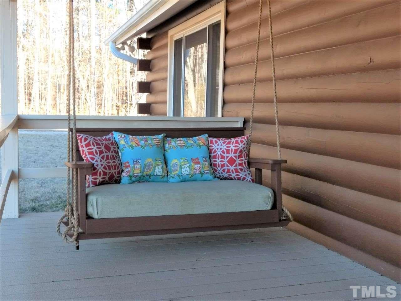 10383 Stallings Road Spring Hope, NC 27882 - Photo 4 of 25 a bedroom with a bed and window