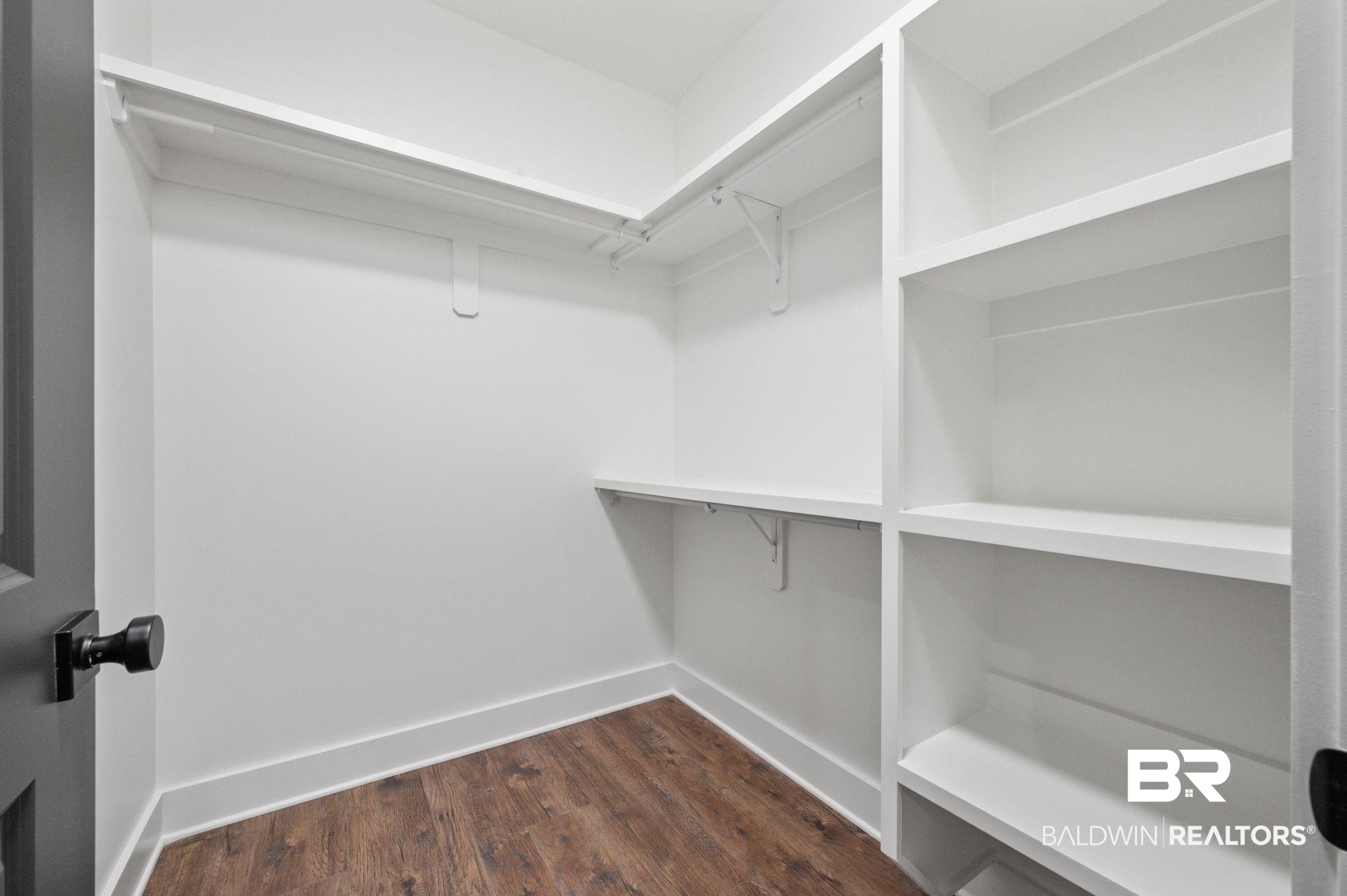 12412 Mannich Lane Foley, AL 36535 - Photo 16 of 23 Spacious closet featuring hardwood / wood-style floors