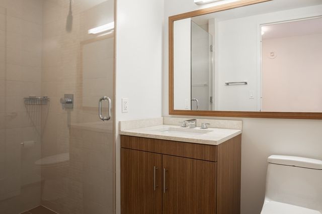 a bathroom with a sink and mirror