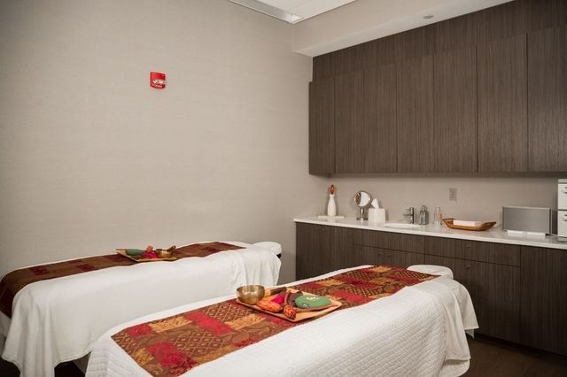 a bedroom with a bed and a closet