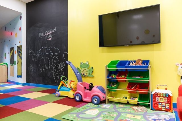 a room with toys and a flat screen tv