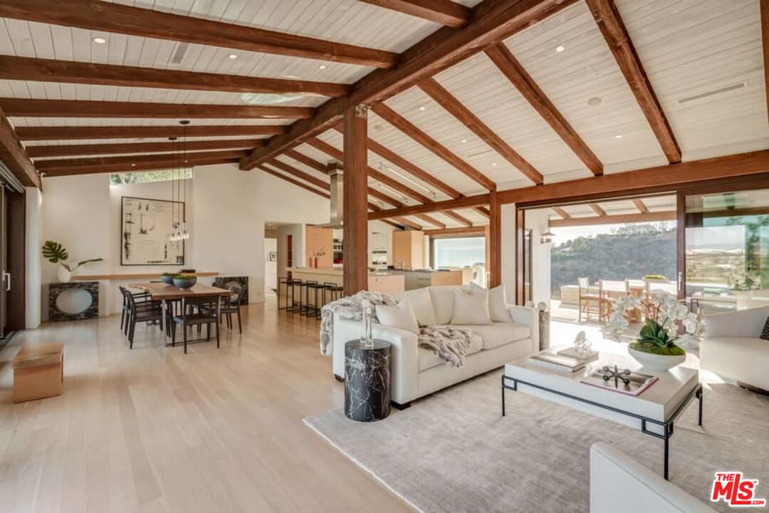 1888 Mango Way Los Angeles, CA 90049 - Photo 9 of 44 a living room with furniture and a large window