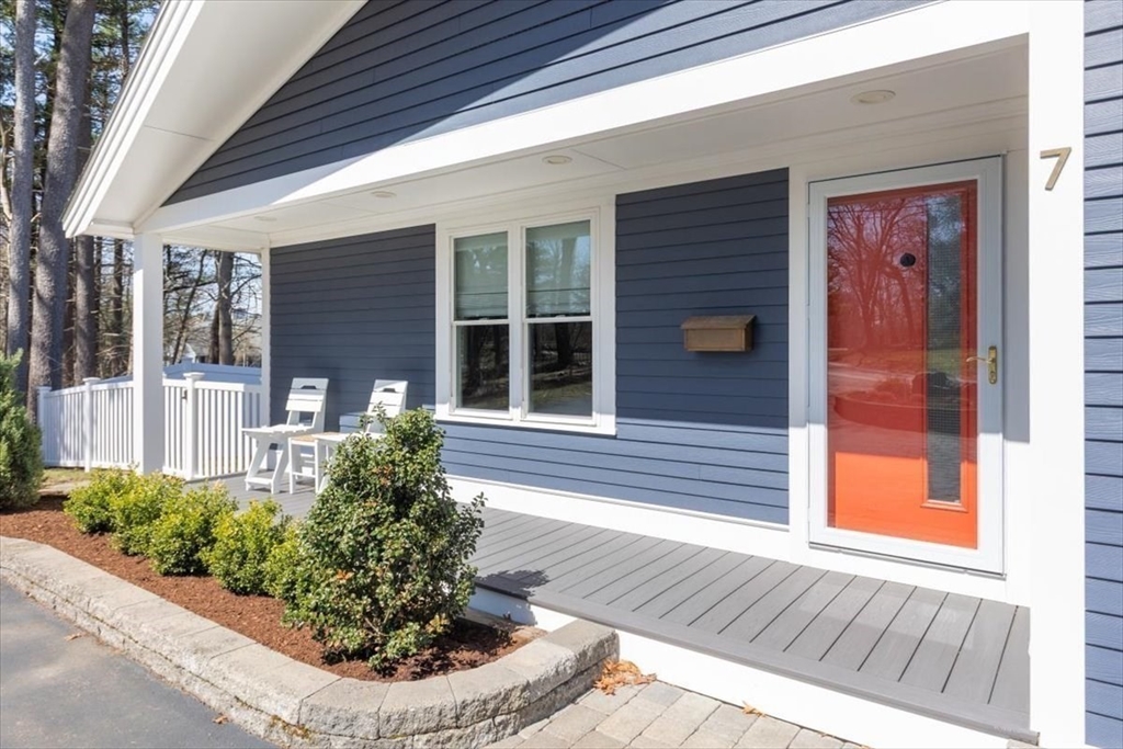 7 Peter Hobart Drive Hingham, MA 02043 - Photo 2 of 38 a front view of a house with garden