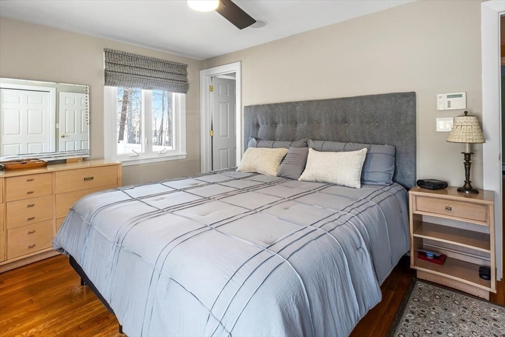 7 Peter Hobart Drive Hingham, MA 02043 - Photo 22 of 38 a bedroom with a bed and a large window