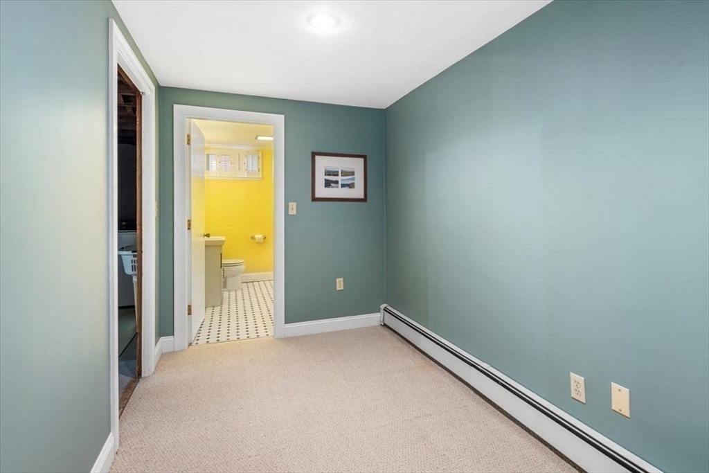 7 Peter Hobart Drive Hingham, MA 02043 - Photo 27 of 38 an empty room with a door