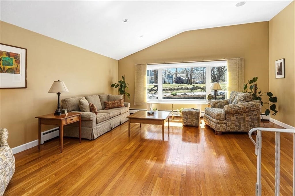 7 Peter Hobart Drive Hingham, MA 02043 - Photo 6 of 38 a living room with furniture and a large window