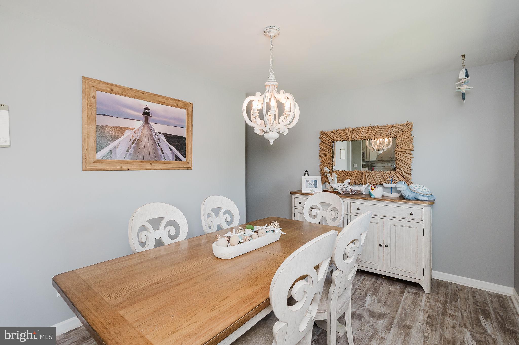 2222 Monocacy Road Essex, MD 21221 - Photo 12 of 70 Charming dining space with coastal flair.