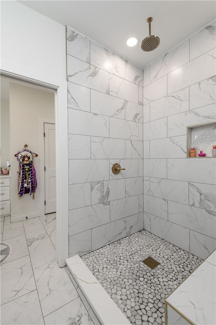 504 Eden Lane Bryan, TX 77803 - Photo 12 of 24 a bathroom with a shower