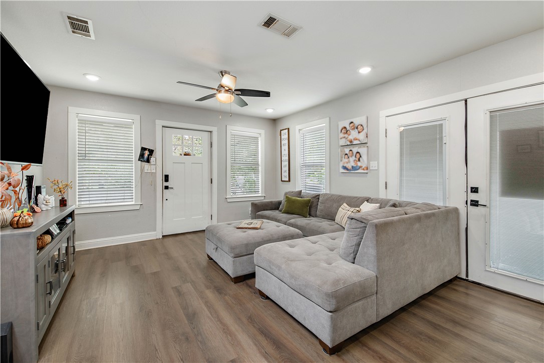 504 Eden Lane Bryan, TX 77803 - Photo 5 of 24 a living room with furniture and a flat screen tv