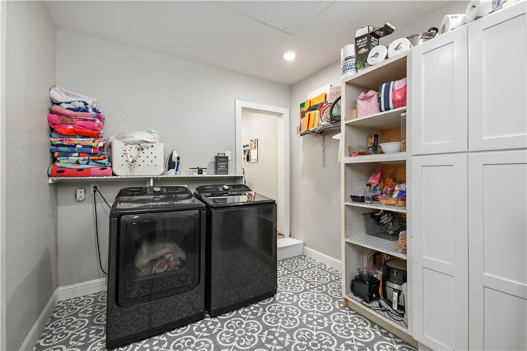 504 Eden Lane Bryan, TX 77803 - Photo 7 of 24 a utility room with stainless steel appliances and a window