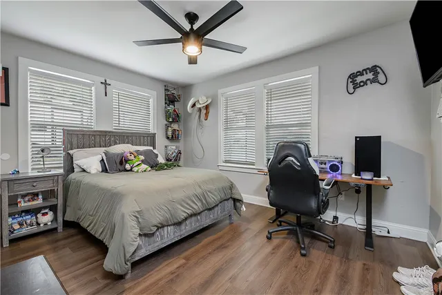 a utility room with stainless steel appliances and a window