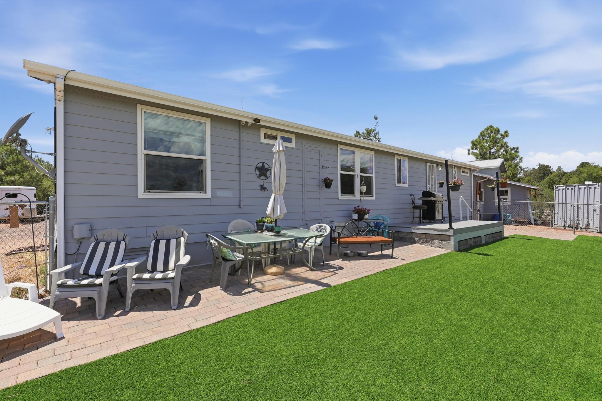 1211 Heather Circle Payson, AZ 85541 - Photo 46 of 51 a backyard of a house with table and chairs