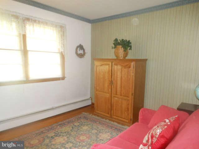 2409 Stoneybrook Road Fallston, MD 21047 - Photo 12 of 16 a bedroom with a bed and a window