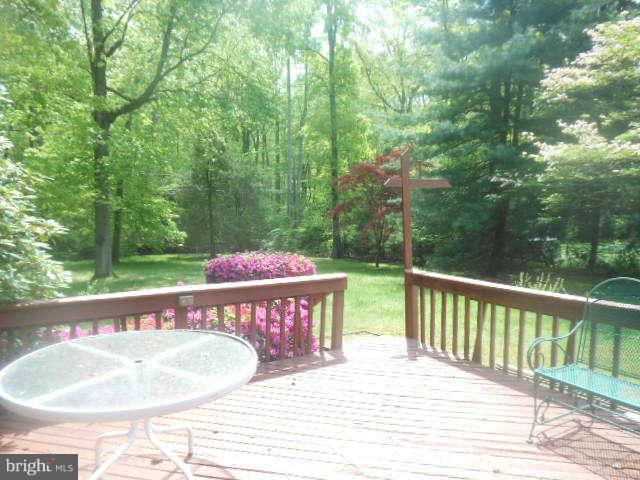 2409 Stoneybrook Road Fallston, MD 21047 - Photo 15 of 16 a view of a wooden dinning table and chairs in the patio