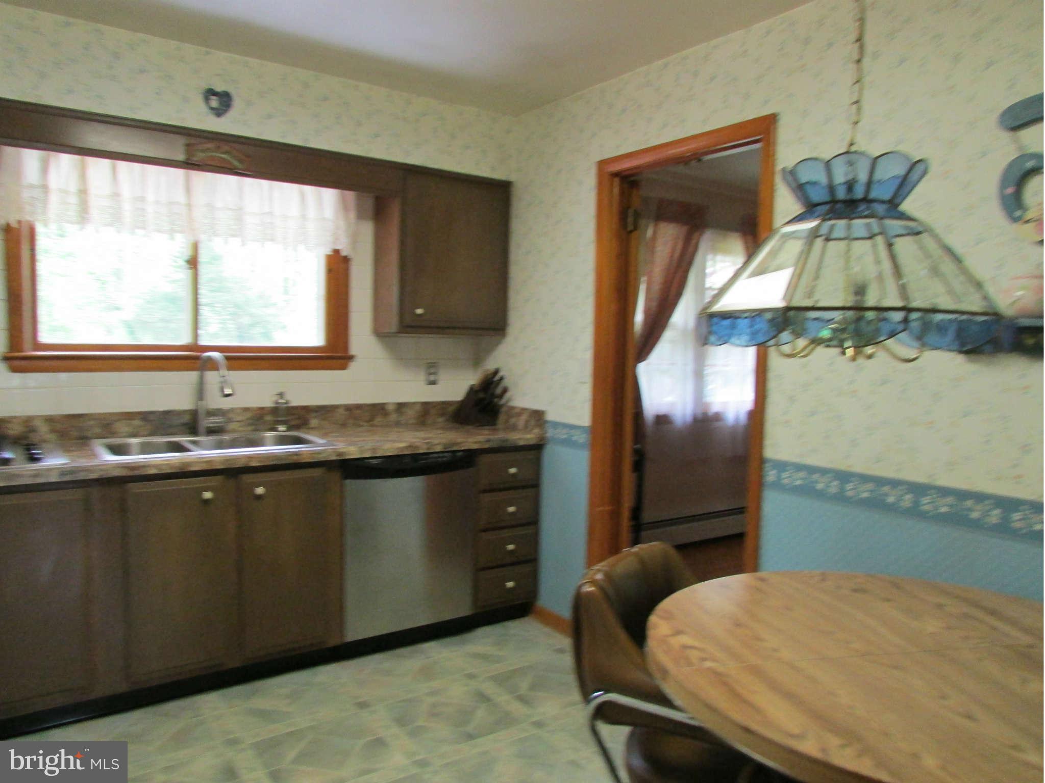 2409 Stoneybrook Road Fallston, MD 21047 - Photo 5 of 16 a kitchen with a sink appliances and a window