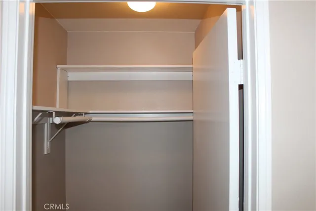 an empty room with a bathroom