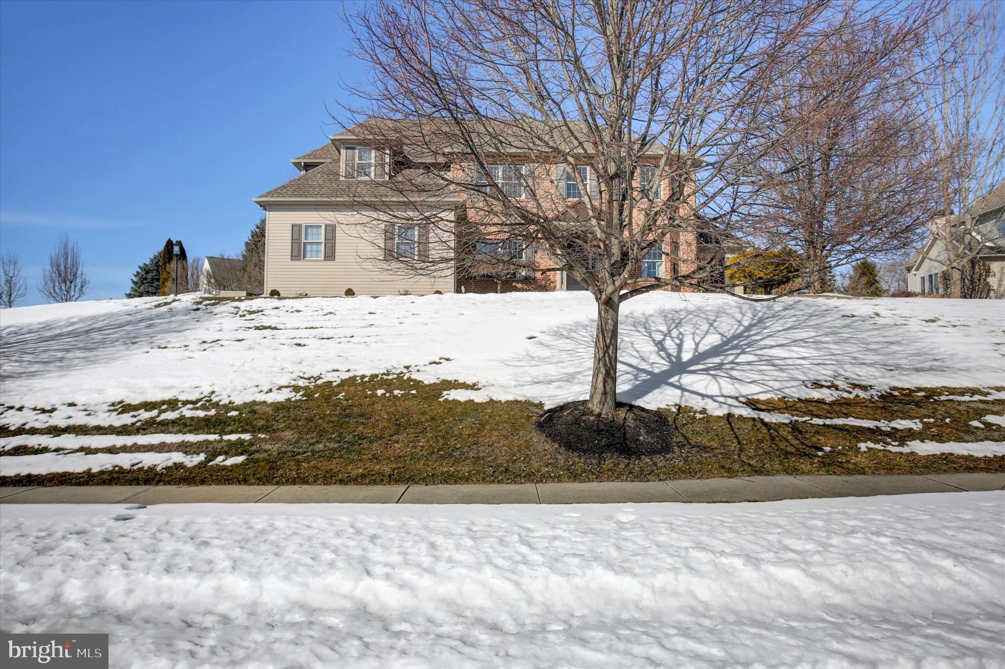a view of a terrace with snow on the road