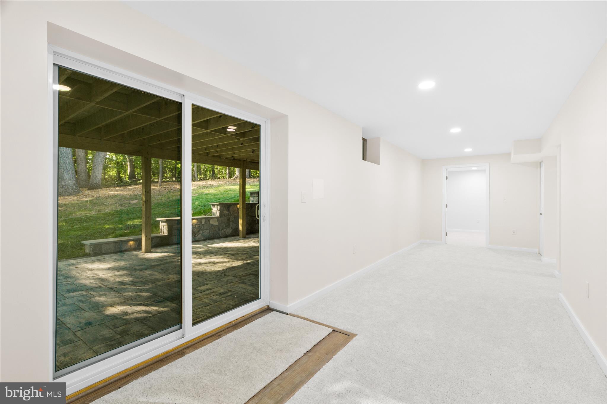 3908 Shakespeare Way Monrovia, MD 21770 - Photo 28 of 59 a view of an empty room with glass door