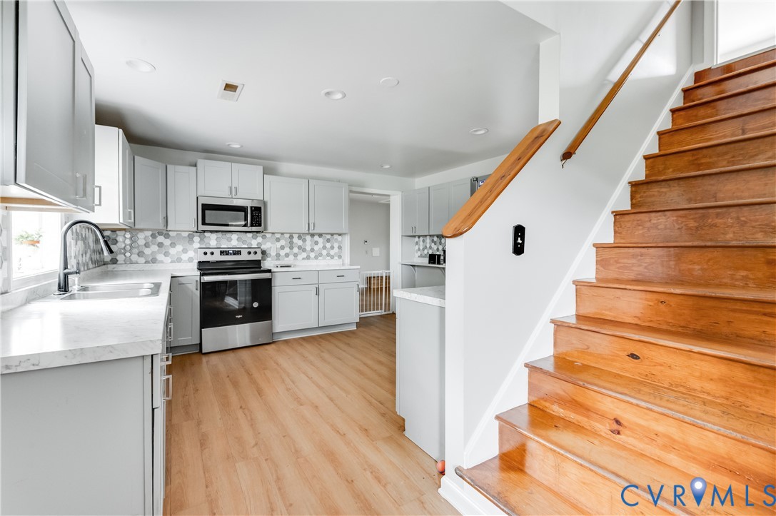 1474 Welsh Tract Road Charlotte Court House, VA 23923 - Photo 8 of 48 Modern kitchen featuring light gray cabinetry, sta