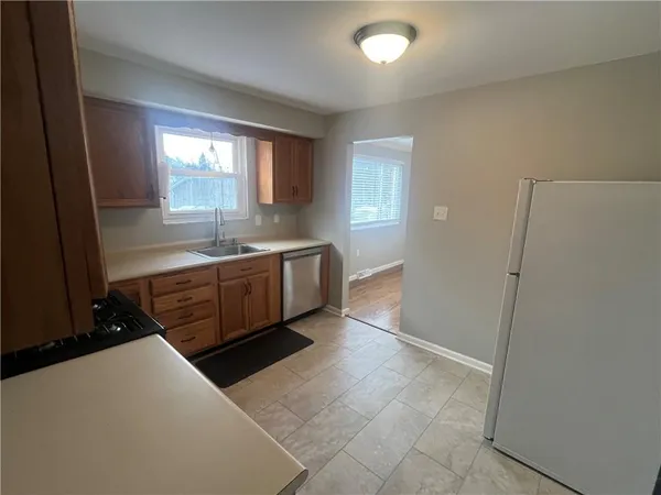 a large bathroom with a large tub and sink
