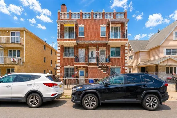 a car parked in front of a house