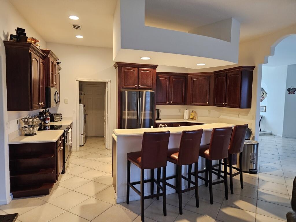 4382 Southwest Paley Road Port St. Lucie, FL 34953 - Photo 8 of 19 08-Large Kitchen