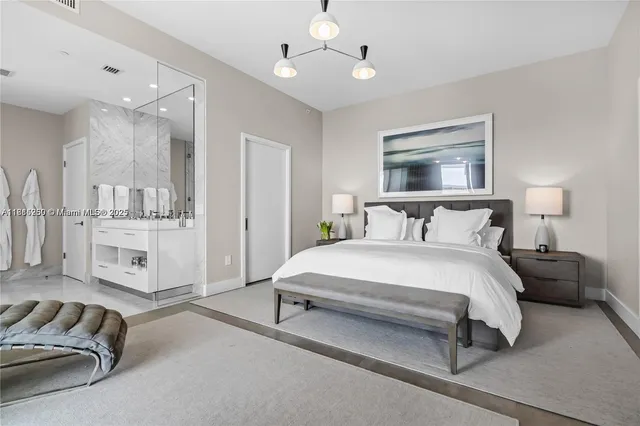 a view of a patio with table and chairs and potted plants