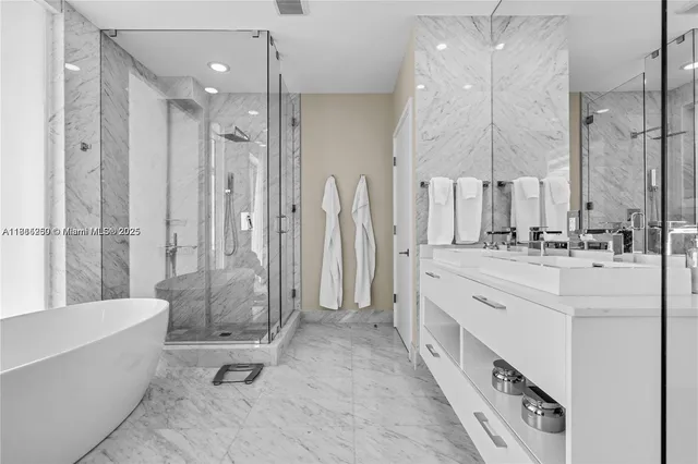 a living room with furniture and a chair