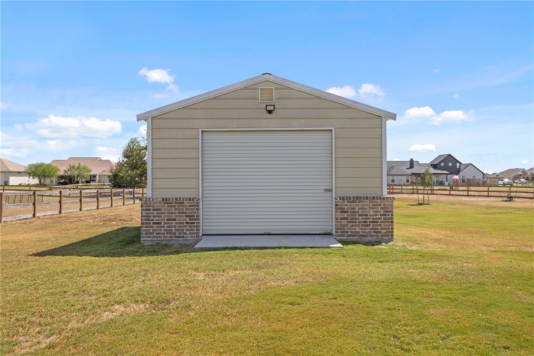 10356 Whiskey River Road Bryan, TX 77808 - Photo 33 of 39 a front view of house with yard