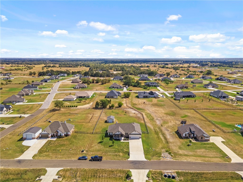 10356 Whiskey River Road Bryan, TX 77808 - Photo 34 of 39 an aerial view of residential houses with outdoor space