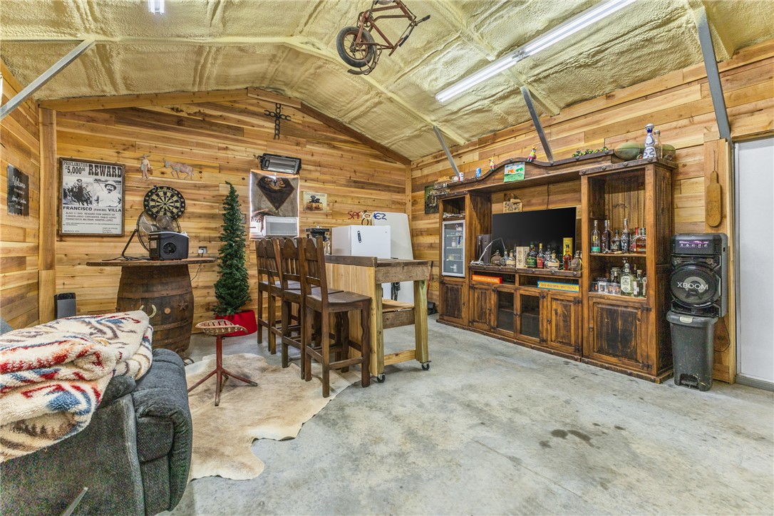 10356 Whiskey River Road Bryan, TX 77808 - Photo 6 of 39 a view of a storage room with a lot of stuff