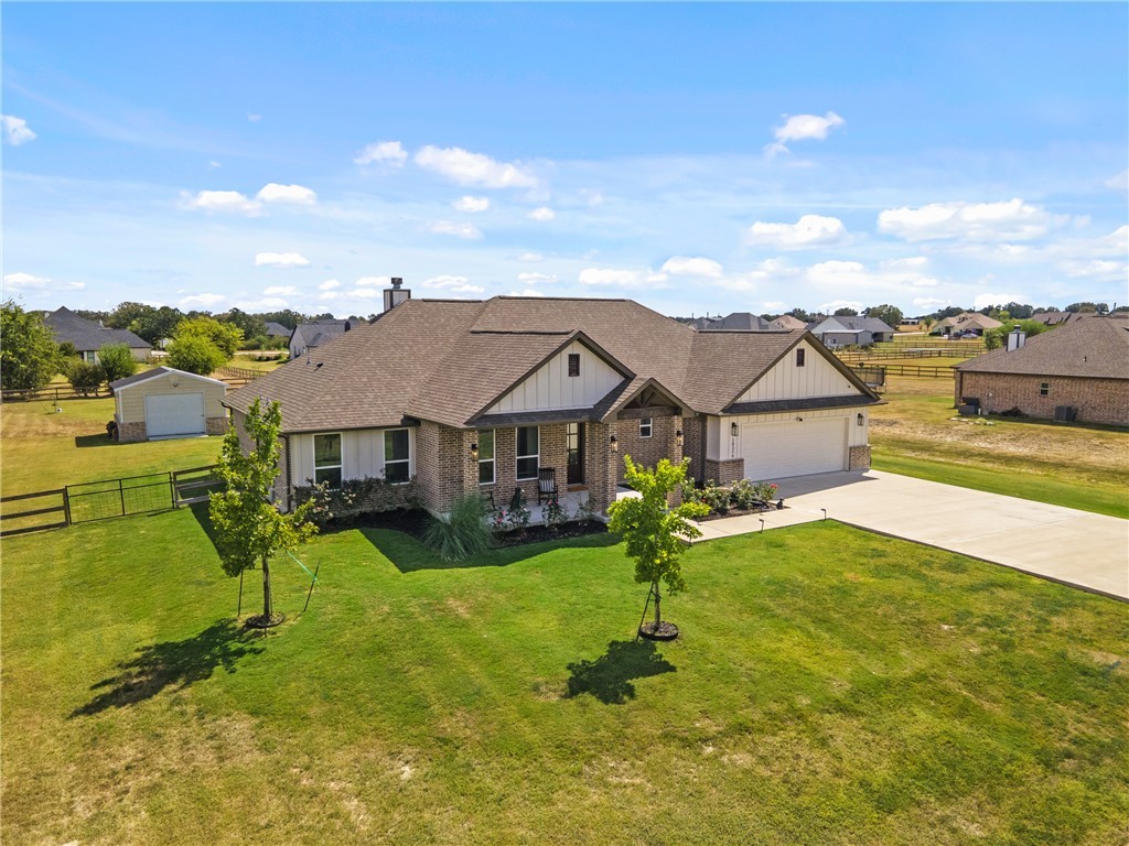 10356 Whiskey River Road Bryan, TX 77808 - Photo 9 of 39 an aerial view of a house with swimming pool and furniture